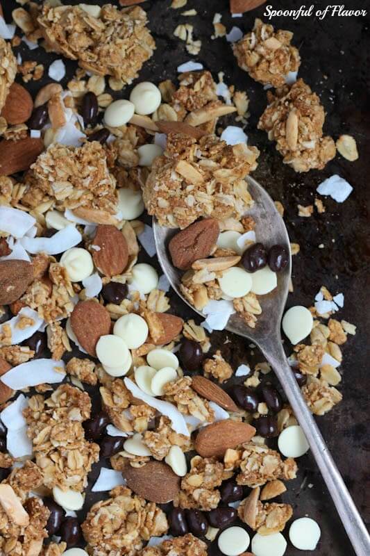 Granola Trail Mix - Chunks of granola combined with almonds, coconut, white chocolate and chocolate covered pomegranate seeds!