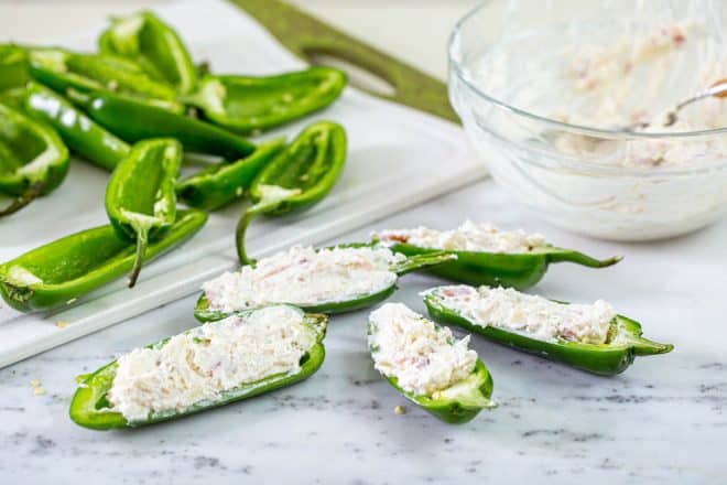 Fresh jalapenos stuffed with cream cheese filling.