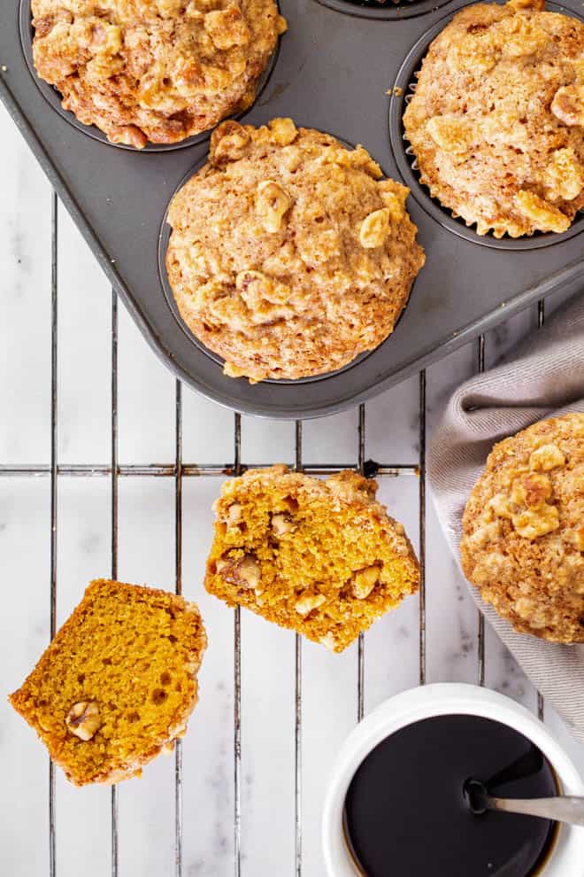 pumpkin muffins on a baking rack