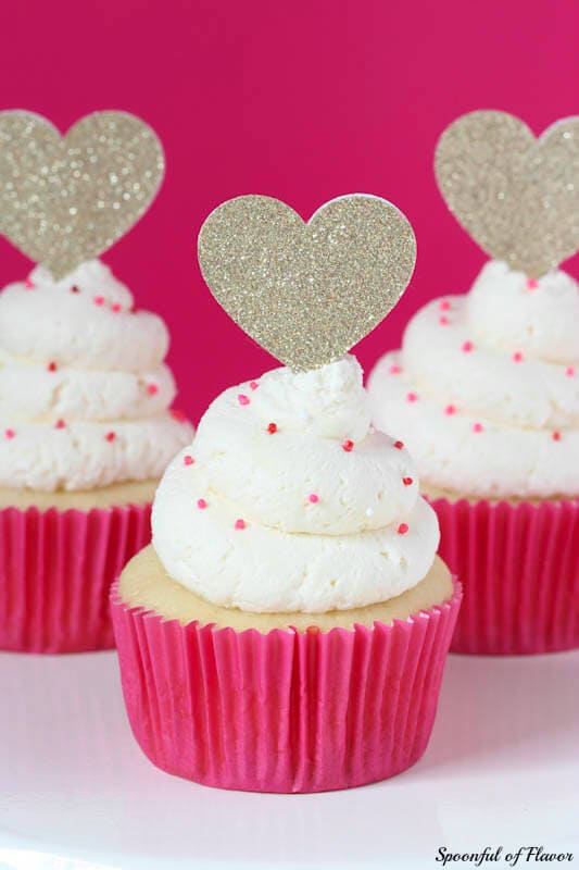 Whipped Vanilla Cupcakes - the prettiest little cupcakes with a whipped vanilla frosting!