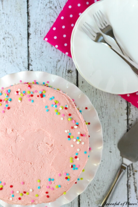Vanilla Bean Cake with Strawberry Buttercream - moist and decadent cake with the most flavorful strawberry frosting!