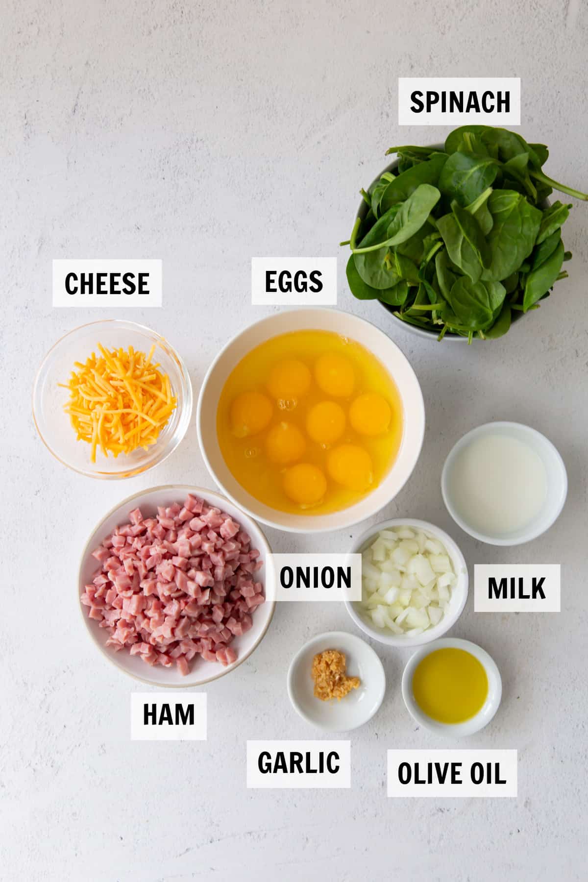 ingredients for frittata on white countertop