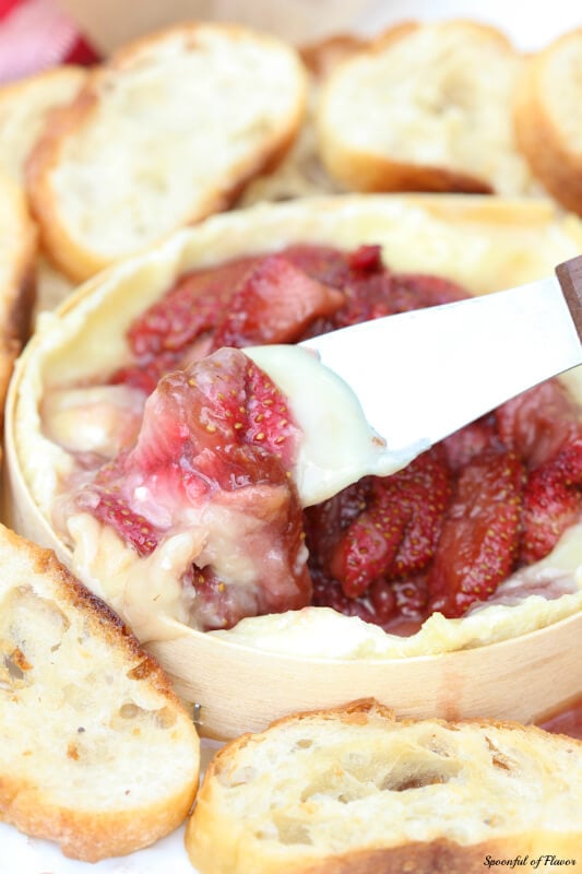 Baked Brie with Balsamic Strawberries - an easy summer appetizer! Cheesy goodness combined with balsamic strawberries!