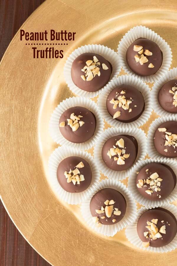 Peanut Butter Truffles - creamy peanut butter coated in chocolate and topped with peanuts!