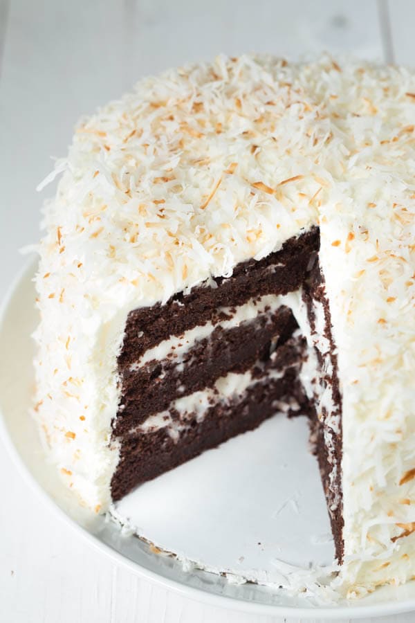 Chocolate Cake with Coconut Cream Filling and Marshmallow Buttercream Frosting - the perfect cake recipe for birthdays, holidays, parties and more!