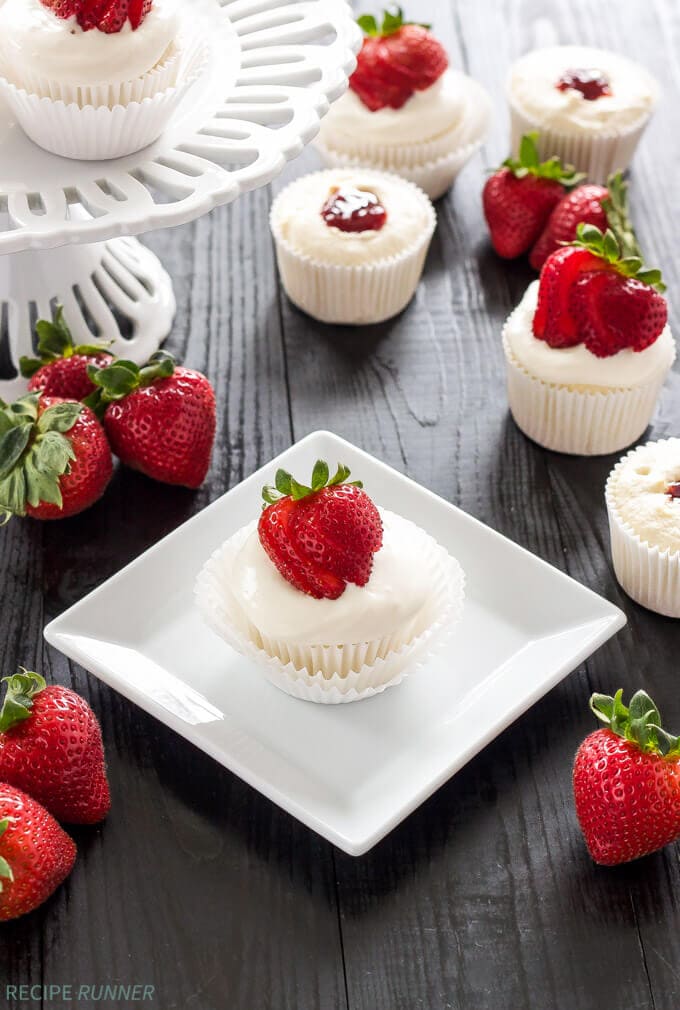 angel food cupcake on a plate with more to the side on a table