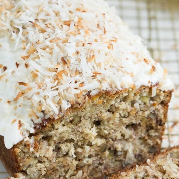 Banana Coconut Crunch Bread with Coconut Cream Icing - a simple quick bread that will add flavor to any morning!
