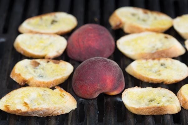 Grilled Peach Crostini with Arugula, Prosciutto and Goat Cheese is the perfect light summer snack, appetizer or lunch!