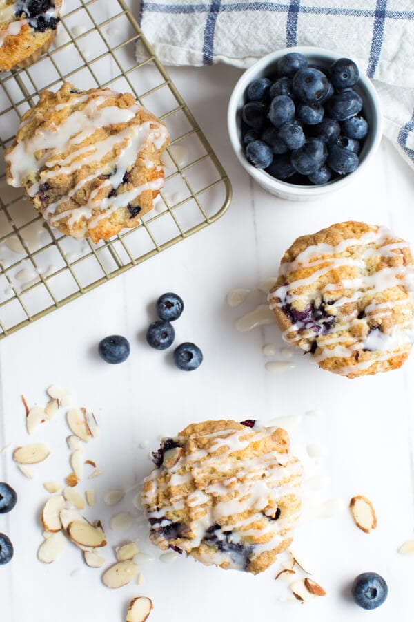 Blueberry Coffee Cake Muffins combine the best of blueberry muffins and coffee cake muffins with a sugar drizzle!