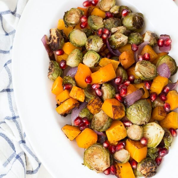 Balsamic Roasted Butternut Squash and Brussels Sprouts with Pomegranate Seeds is an easy flavorful side dish!