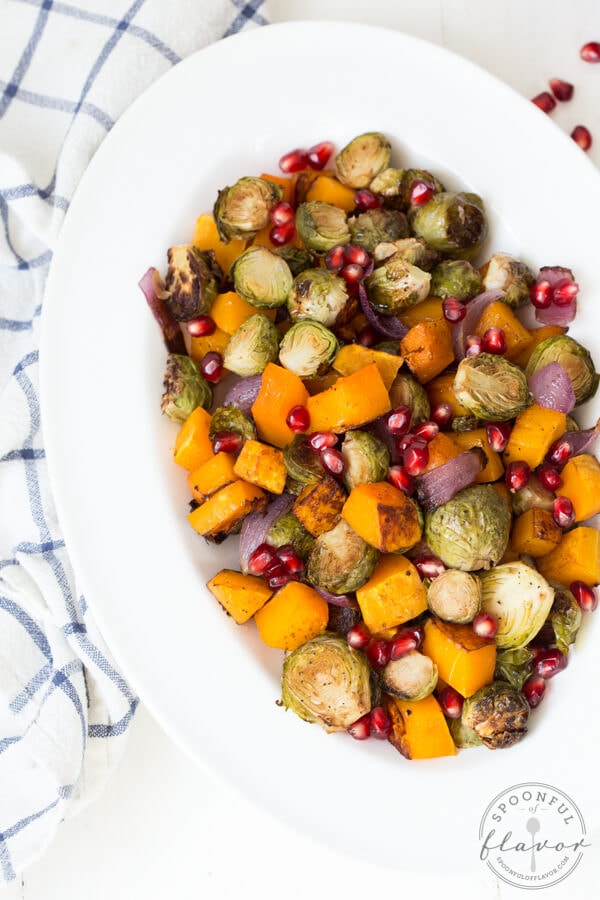 Balsamic Roasted Butternut Squash and Brussels Sprouts with Pomegranate Seeds is an easy flavorful side dish! 