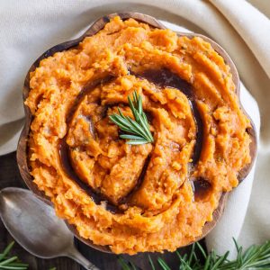 Brown Butter and Rosemary Mashed Sweet Potatoes | Four ingredients are all you need to make these delicious savory mashed sweet potatoes!