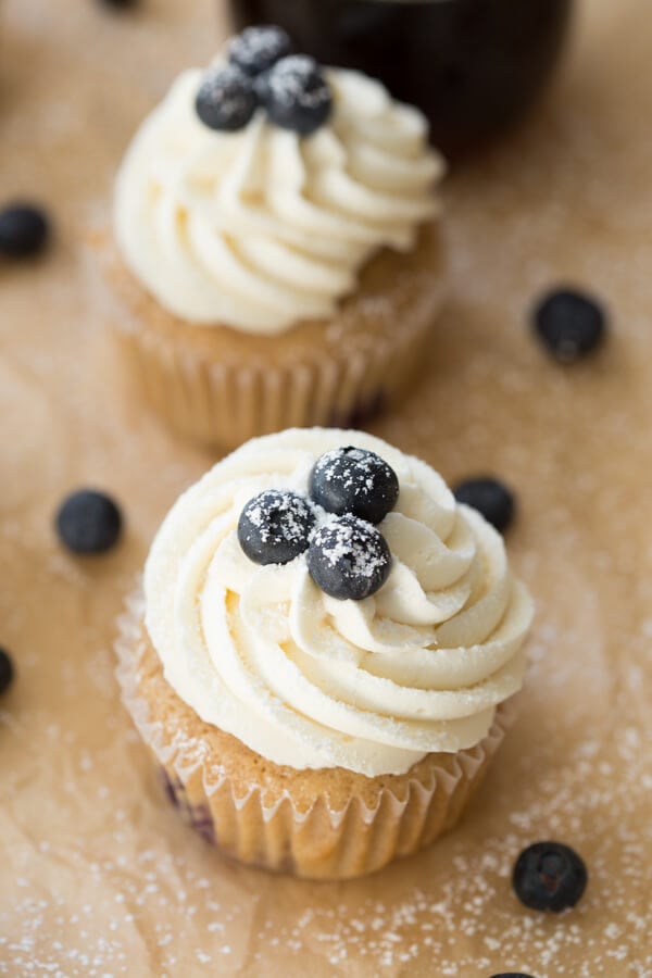 Blueberry French Toast Cupcakes are irresistible! A cinnamon maple cake is topped with maple buttercream frosting and fresh blueberries.