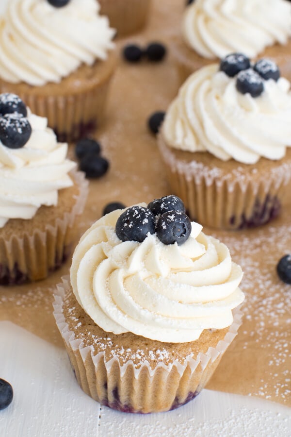 Blueberry French Toast Cupcakes are irresistible! A cinnamon maple cake is topped with maple buttercream frosting and fresh blueberries.