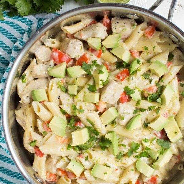 One Pot Creamy Salsa Verde and Lime Chicken Pasta is made with pasta, chicken, lime, tomatillo pasta and cheesy goodness! Everything cooks in one pot too.