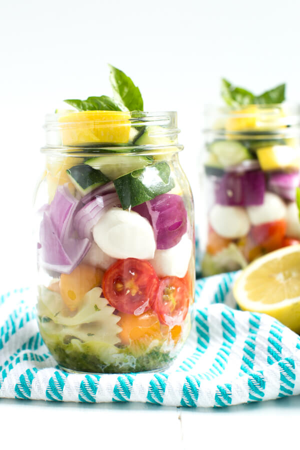 Lemon Basil Vegetable Pasta Salad in a Jar – five layers of flavors combine with a fresh lemon basil dressing to create this easy pasta salad!