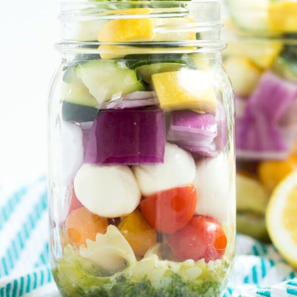 Lemon Basil Vegetable Pasta Salad in a Jar – five layers of flavors combine with a fresh lemon basil dressing to create this easy pasta salad!