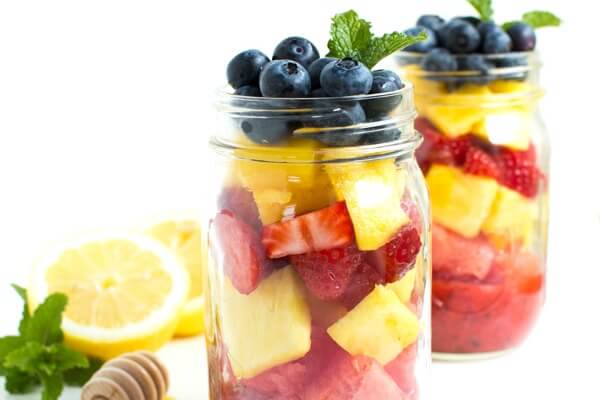 Mason Jar Fruit Salad with Strawberry Mint Dressing - Spoonful of Flavor