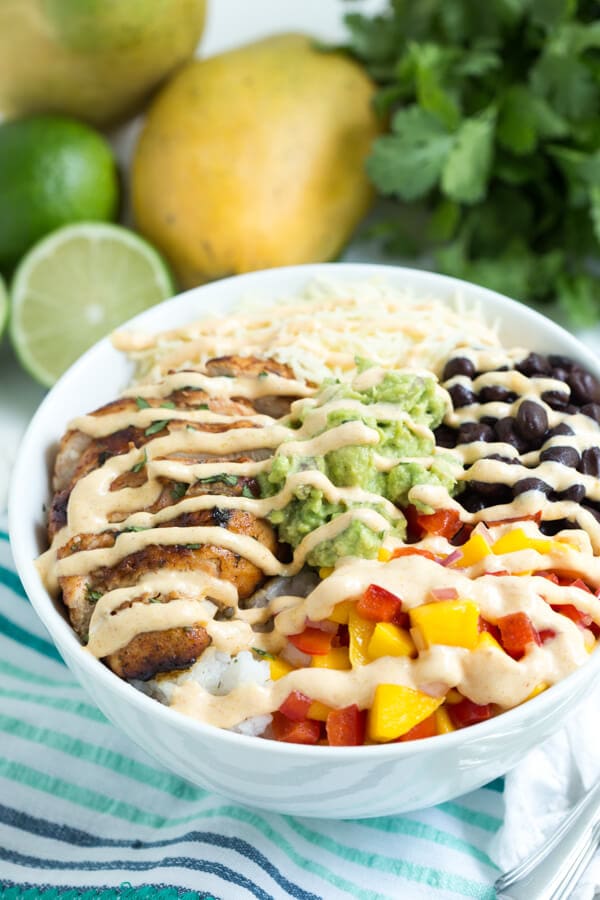 Chipotle Lime Chicken Taco Bowls with Mango Chipotle Sauce are packed with the freshest flavors! 