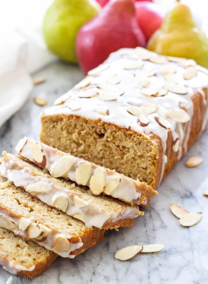 Cardamom Pear Bread with Almond Glaze is the perfect quick bread to make for brunch or a holiday breakfast! The flavors of warm, citrusy cardamom, juicy pears and a sweet almond glaze will have you grabbing a second slice! | www.reciperunner.com