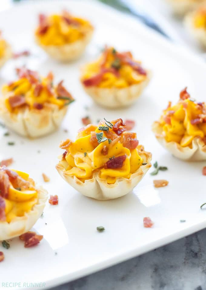 Mini Bacon Butternut Squash Cups | Creamy butternut squash and sage filling topped with crisp salty bacon, the perfect fall or holiday appetizer! 