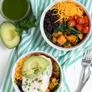 Sauteed Sweet Potato and Greens Breakfast Bowl is made with sweet potato, fresh greens, black beans, tomatoes, cheese, egg and avocado! This simple and healthy meal is perfect for any day of the week.