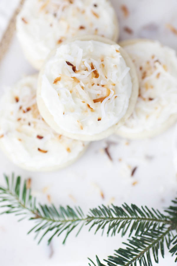 Toasted Coconut Soft Sugar Cookies combine everything you love about your favorite store-bought sugar cookie with homemade buttercream frosting and toasted coconut!