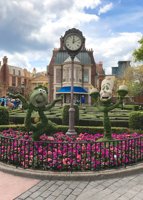 Foodie's Guide to the 2017 Epcot International Flower and Garden Festival features festival highlights and foodie favorites. Download a free printable guide featuring unique Disney topiaries, gardens and delectable meals from around the world!