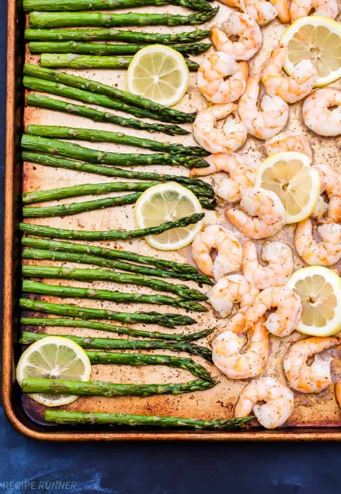 Sheet pan Lemon Roasted Shrimp and Asparagus with Herbed Couscous is one of the easiest dinners I've made and It's full of gourmet flavor! It can be on the table in 15 minutes or less!