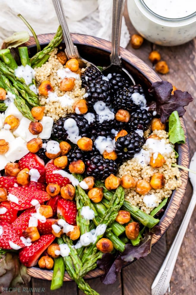 Berry, Asparagus, Quinoa and Feta Salad with Sweet Crispy Chickpeas is bursting with spring produce and topped with the most addicting sweet, crispy, maple cinnamon roasted chickpeas! It’s perfect to make any day of the week and beautiful enough for company. www.reciperunner.com