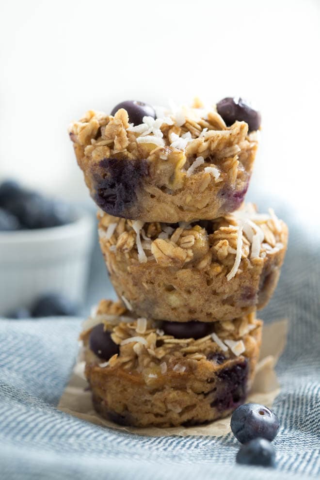 three oatmeal cups stacked on top of each other