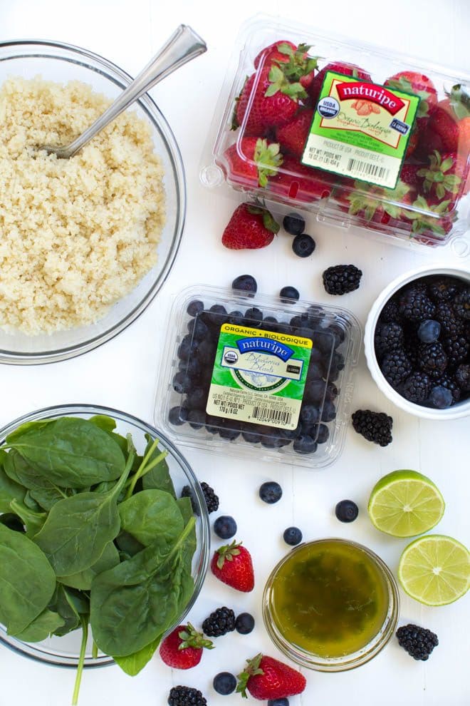 Triple Berry Couscous Salad combines couscous with fresh spinach, strawberries, blueberries and blackberries. Drizzle the homemade honey lime mint dressing over the salad to create a light and flavorful addition to any meal!