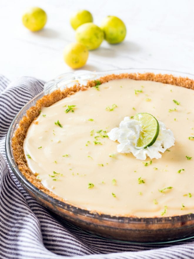 6-ingredient Classic Key lime pie is made with only six ingredients, including sweetened condensed milk to make a smooth and creamy filling. Baked in a graham cracker crust, each bite is sweet, zesty and delicious!