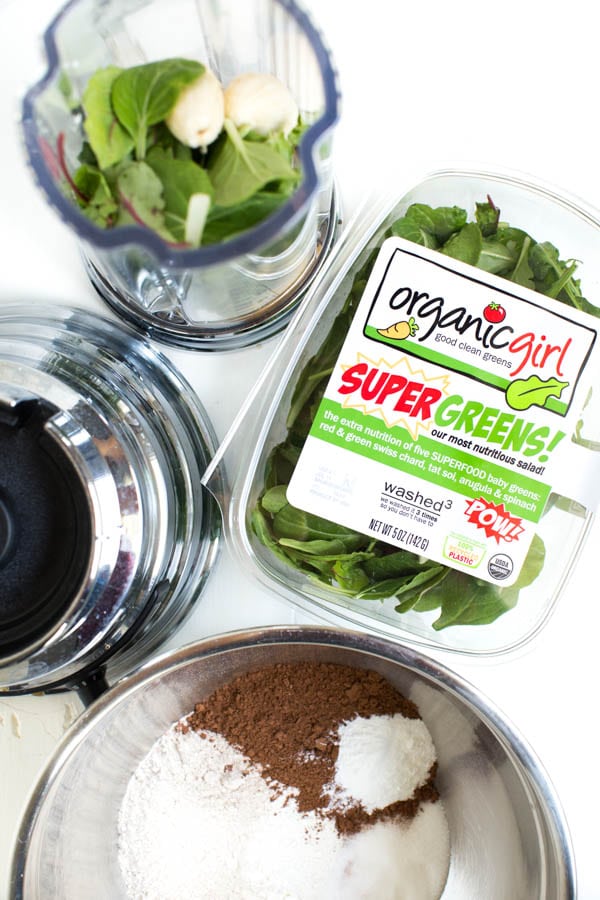 Superfood Double Chocolate Muffins are packed with leafy greens, banana, chocolate and Greek yogurt! You will never know that two heaping cups of greens are hidden in these chocolate muffins. 