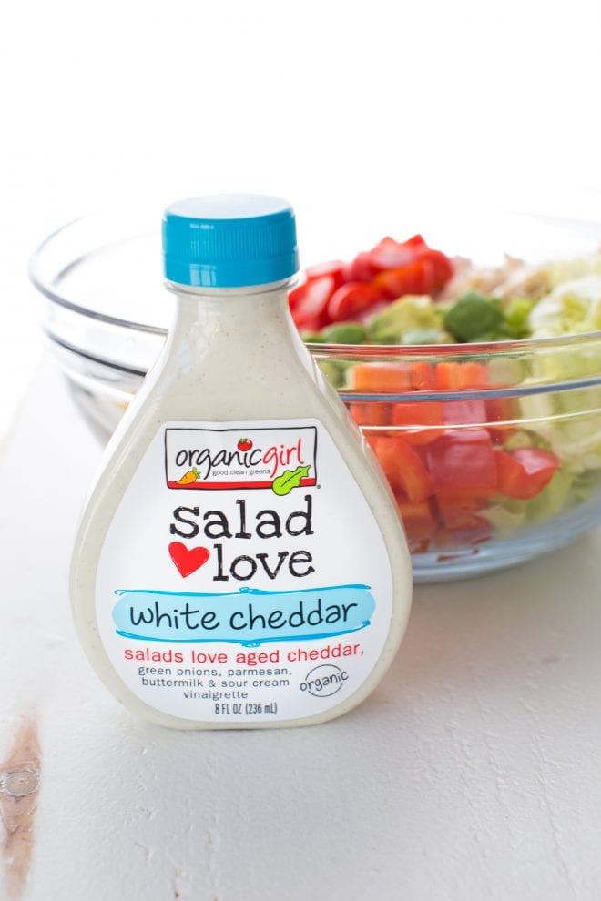 Creamy Chicken Fajita Chopped Salad comes together in less than 15 minutes! It is packed with fresh veggies, butter lettuce, creamy white cheddar dressing and fajita seasoning. 