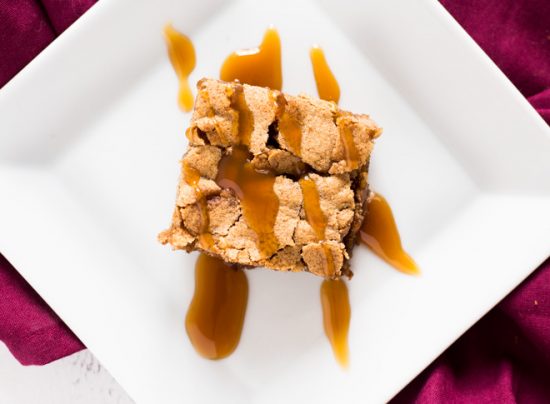 This caramel apple cake is sweet, soft and topped with caramel sauce. | www.ifyougiveablondeakitchen.com