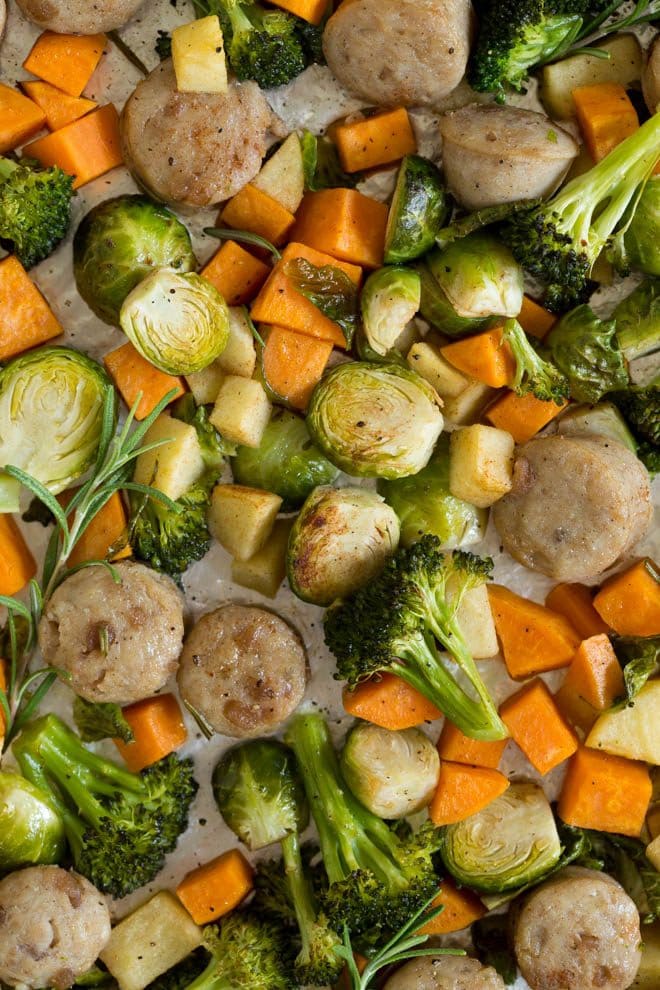 One pan chicken sausage with roasted vegetables and apples is an easy sheet pan meal that is made in less than 30 minutes! A few simple ingredients creates a flavorful fall meal.