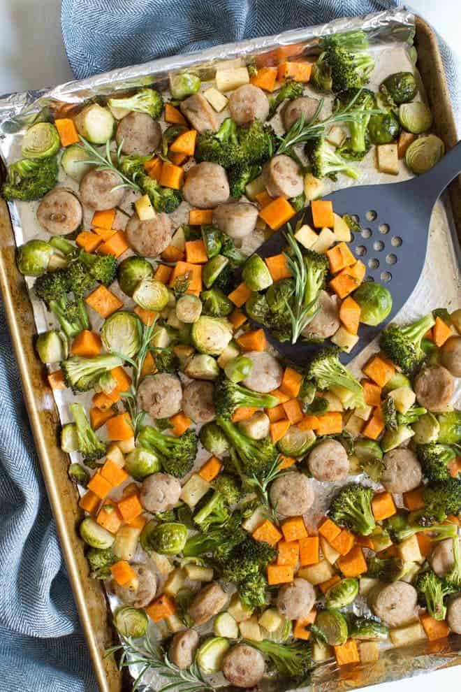 One pan chicken sausage with roasted vegetables and apples is an easy sheet pan meal that is made in less than 30 minutes! A few simple ingredients creates a flavorful fall meal.