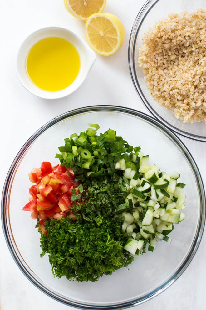 Easy Chopped Tabbouleh Salad is a light and fresh salad made with bulgur wheat, parsley, tomatoes, cucumbers and a few simple seasonings! Enjoy it for lunch or as a side dish to grilled meats.