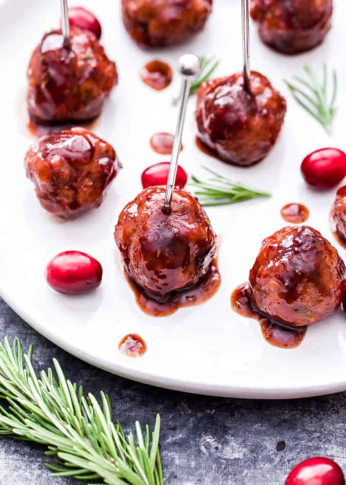 Every party needs a good meatball and these Rosemary Turkey Meatballs with Cranberry Balsamic Sauce are sure to be a crowd pleaser this holiday season! #meatballs #appetizer #turkey #cranberry #glutenfree