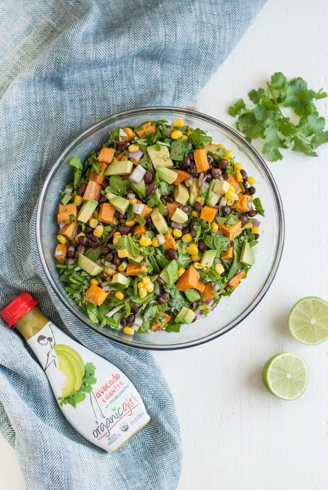 Southwest Sweet Potato Chopped Salad is made with roasted sweet potatoes, black beans, corn, red onion, avocado and chopped greens. It is served with fresh avocado cilantro dressing! #southwest #sweetpotato #chopped #salad #healthy #recipe #organicgirl #avocado #cilantro #dressing #healthyrecipe #lunch #dinner