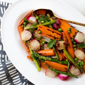 Charred Spring Vegetables with Herbed Carrot Top Dressing is a simple, easy and delicious dish! #spring #vegetables #sidedish #carrottop #dressing #recipe