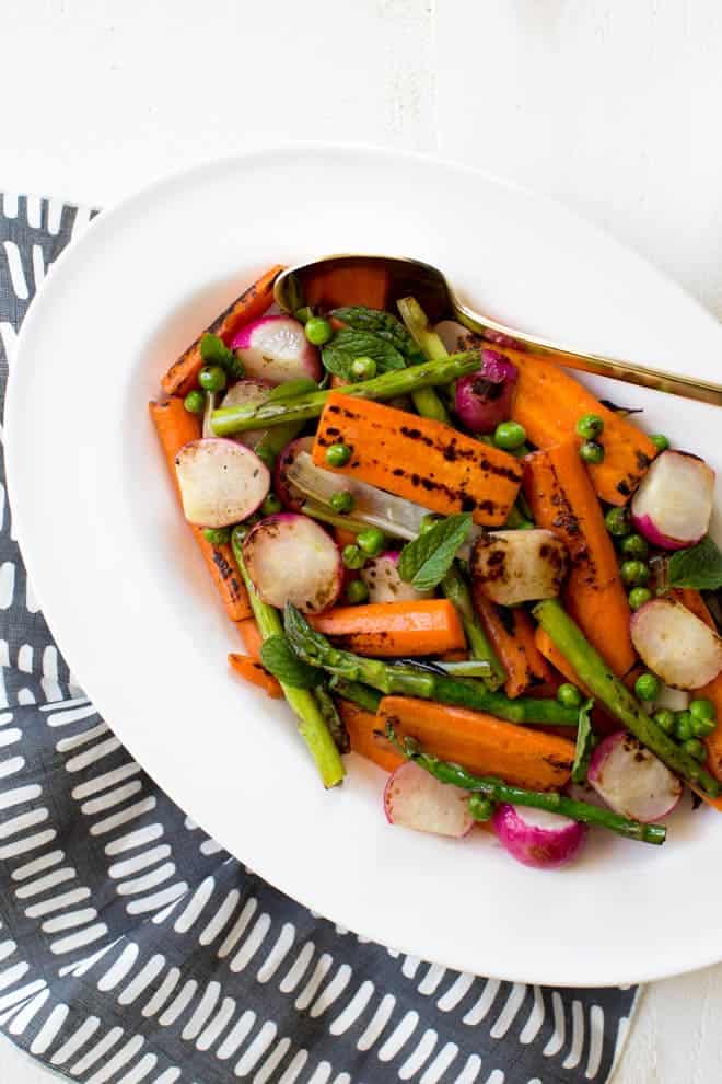Charred Spring Vegetables with Herbed Carrot Top Dressing is a simple, easy and delicious dish! #spring #vegetables #sidedish #carrottop #dressing #recipe