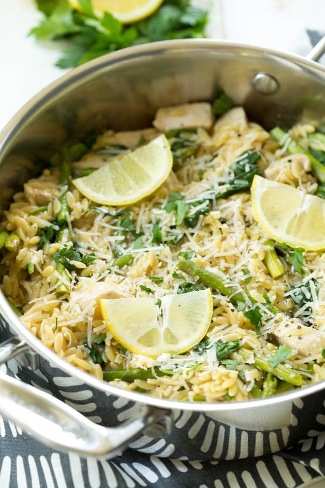 Colorful spring pasta recipes with fresh herbs and bright veggies, perfect for picnics or spring dinner parties