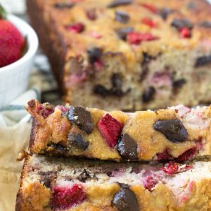 Paleo Chocolate Chunk Strawberry Banana Bread is made in one bowl and comes together easily! The bread is made with fresh strawberries and is naturally gluten free. #glutenfree #bread #strawberry #paleo #healthyrecipe