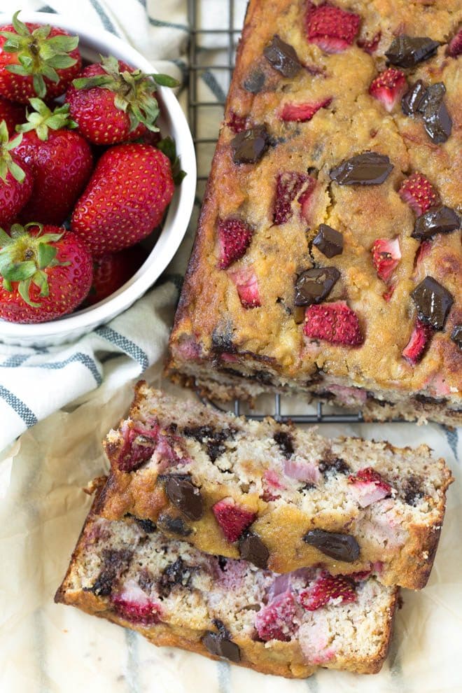 Paleo Chocolate Chunk Strawberry Banana Bread is made in one bowl and comes together easily! The bread is made with fresh strawberries and is naturally gluten free. #glutenfree #bread #strawberry #banana #paleo #healthyrecipe #recipe
