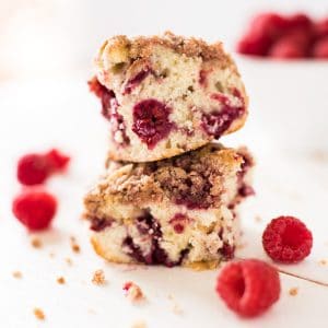 Two slices of raspberry coffee cake stacked on top of each other