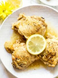 Lemon Garlic Butter Chicken Thighs are made in the Instant Pot with a few simple ingredients! The recipe is low carb and packed with flavor. #healthy #chicken #recipe #instantpot #lowcarb #dinner