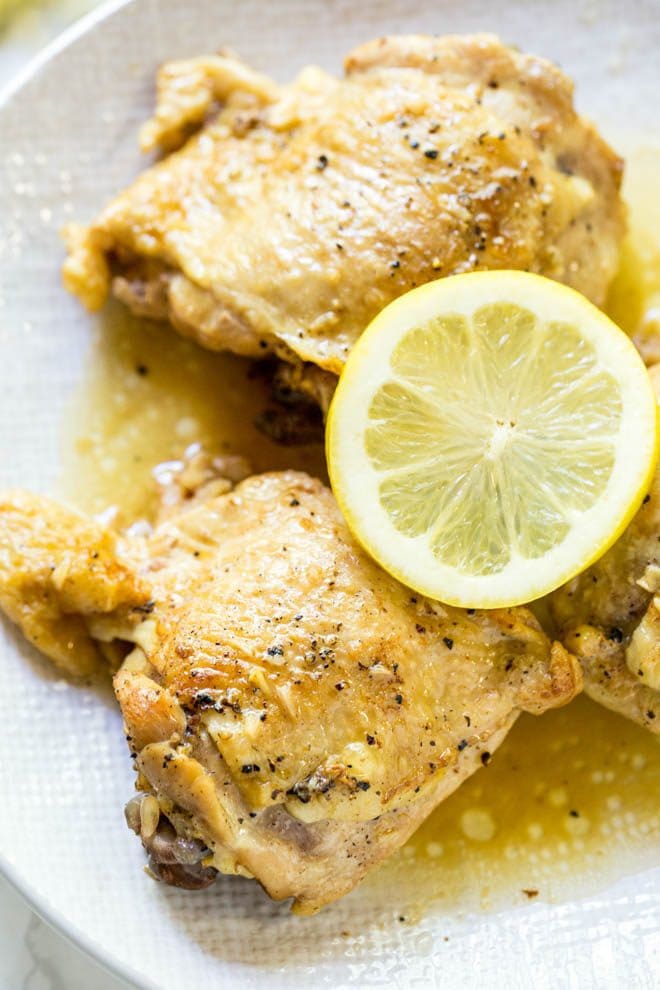 Lemon Garlic Butter Chicken Thighs are made in the Instant Pot with a few simple ingredients! The recipe is low carb and packed with flavor. #pressurecooker #instantpot #lowcarb #keto #recipe