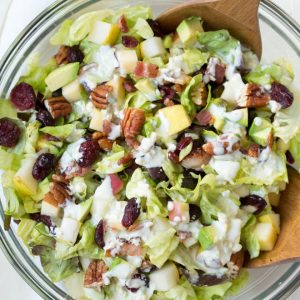 Autumn Chopped Salad is made with the freshest fall flavors including apples, pears, cranberries, bacon, avocado, butter greens and a creamy white cheddar dressing! #apple #pear #autumn #fall #salad #healthy #organicgirl #greens #fall #mealprep